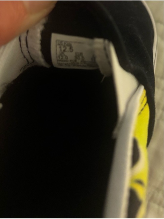 Vans Kids Slip-On Sneakers in Black and Yellow Flame Pattern - Picture 5 of 7